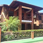 Linda casa Porto das Dunas: 4 suítes, churrasqueira e piscina